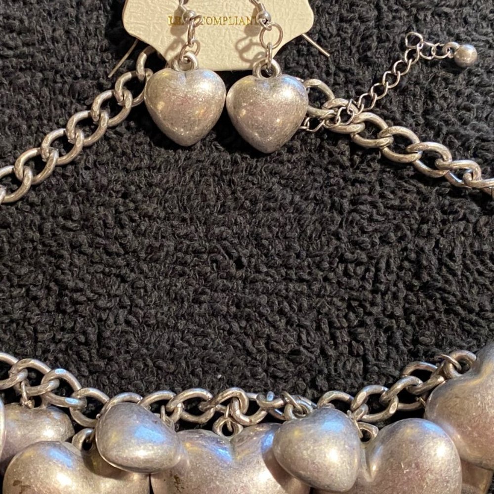 Silver tone fashion heart necklace and earring set